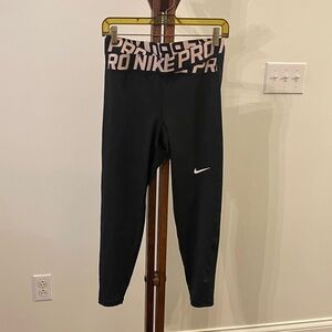 Nike Women’s Black and Pink Leggings